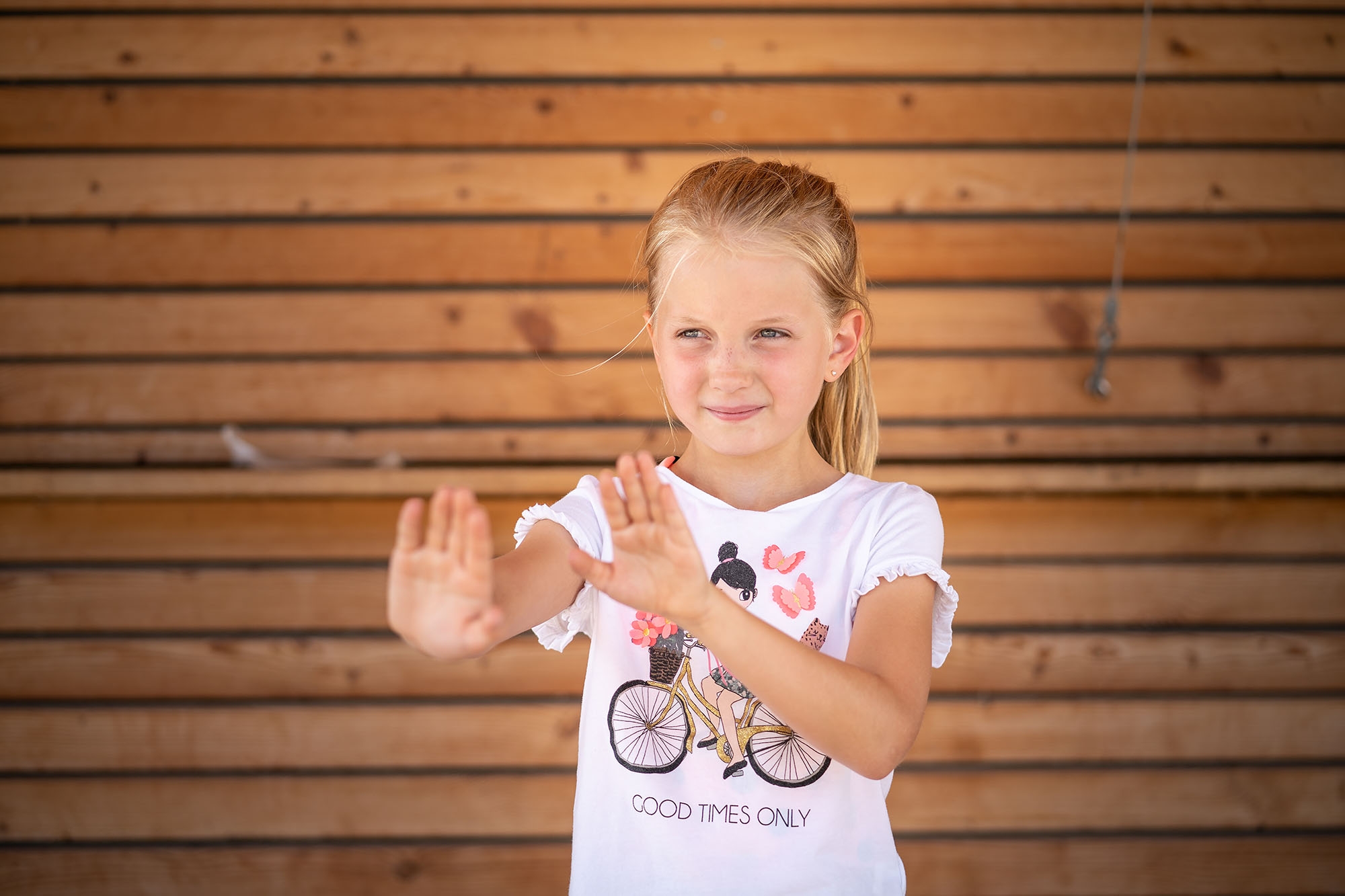 Defence Girl with hands outstretched defensively