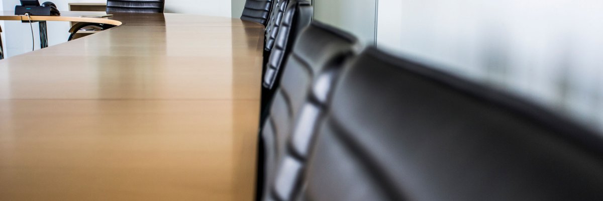 Chairs pushed under a table