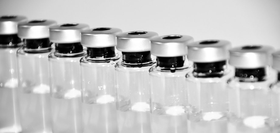 Vaccine vials with a clear liquid