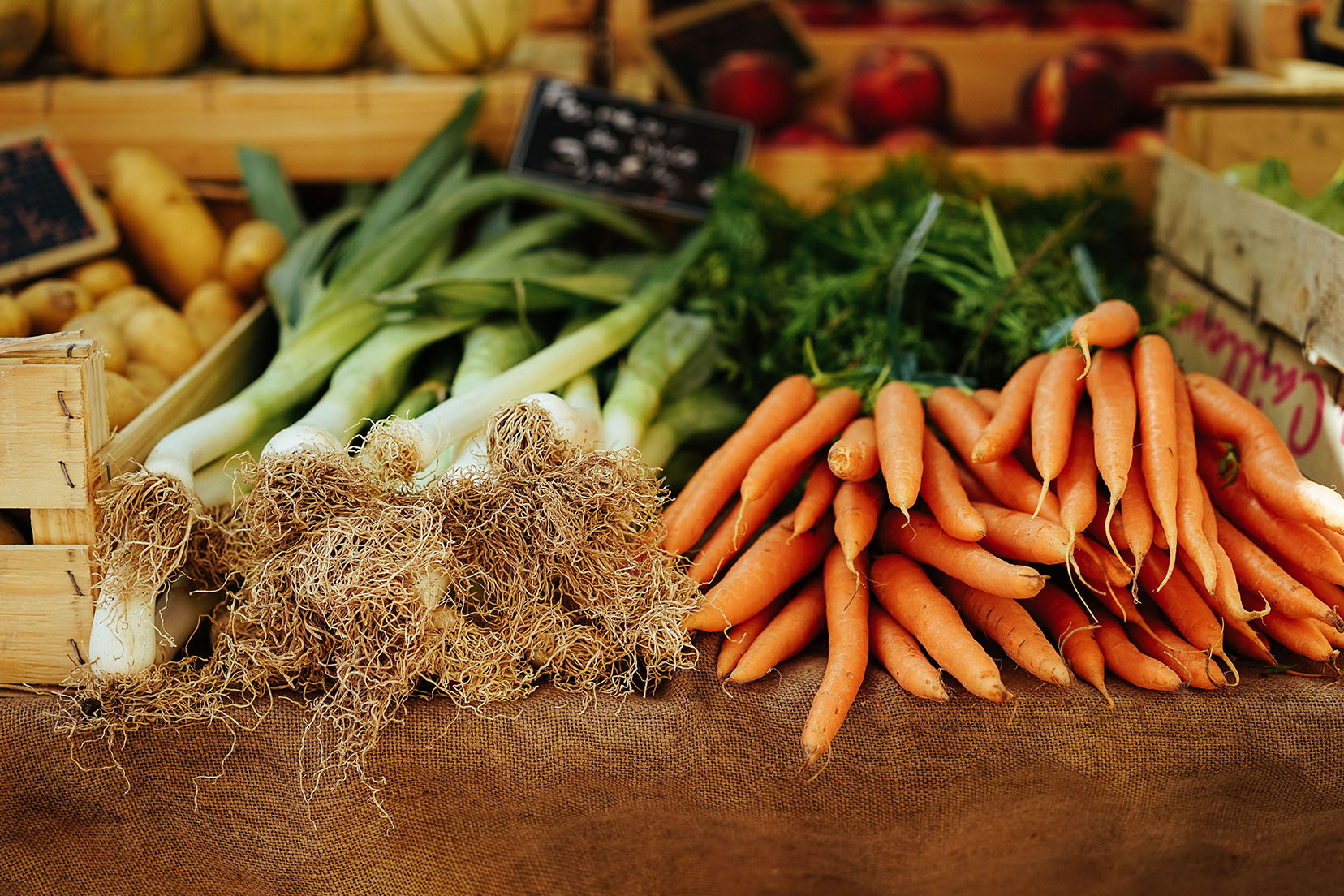 Vegetables Carrot bunch and leek bunch in a farm shop
