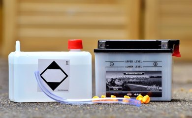 Battery acid and a car battery.